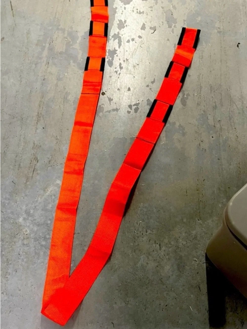 2 Orange and Black Forearm Forklift Moving Straps